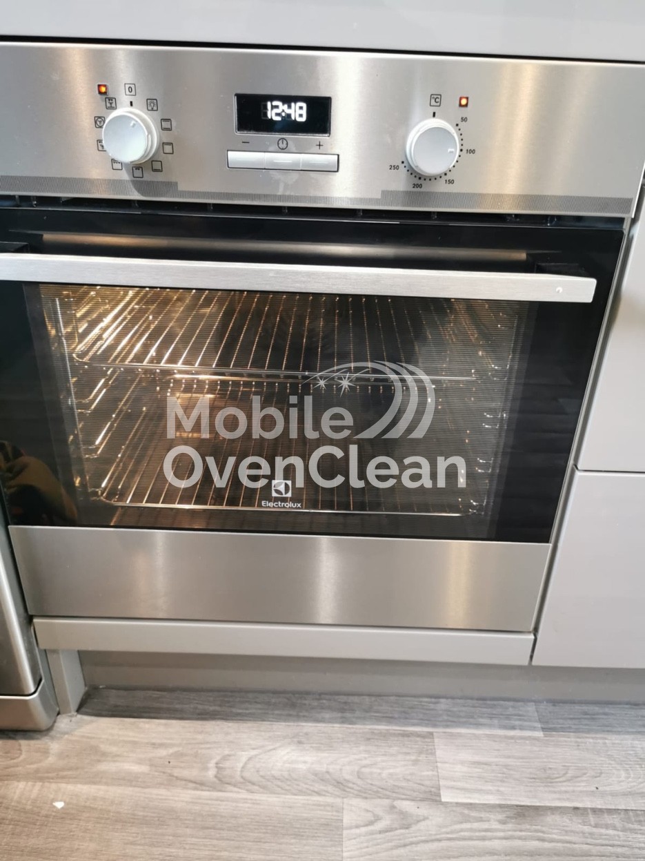 Oven after professional cleaning — sparkling clean interior, like new condition