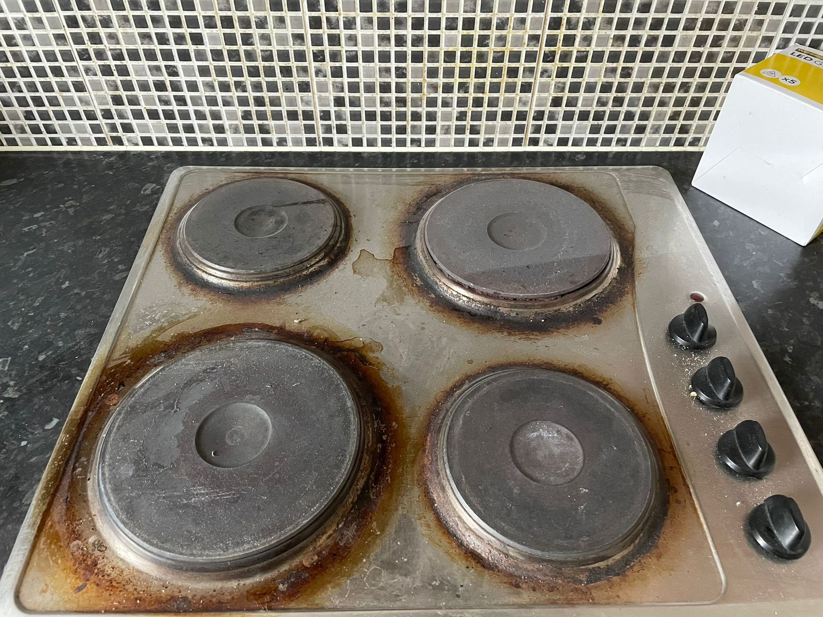 Hob before professional oven cleaning