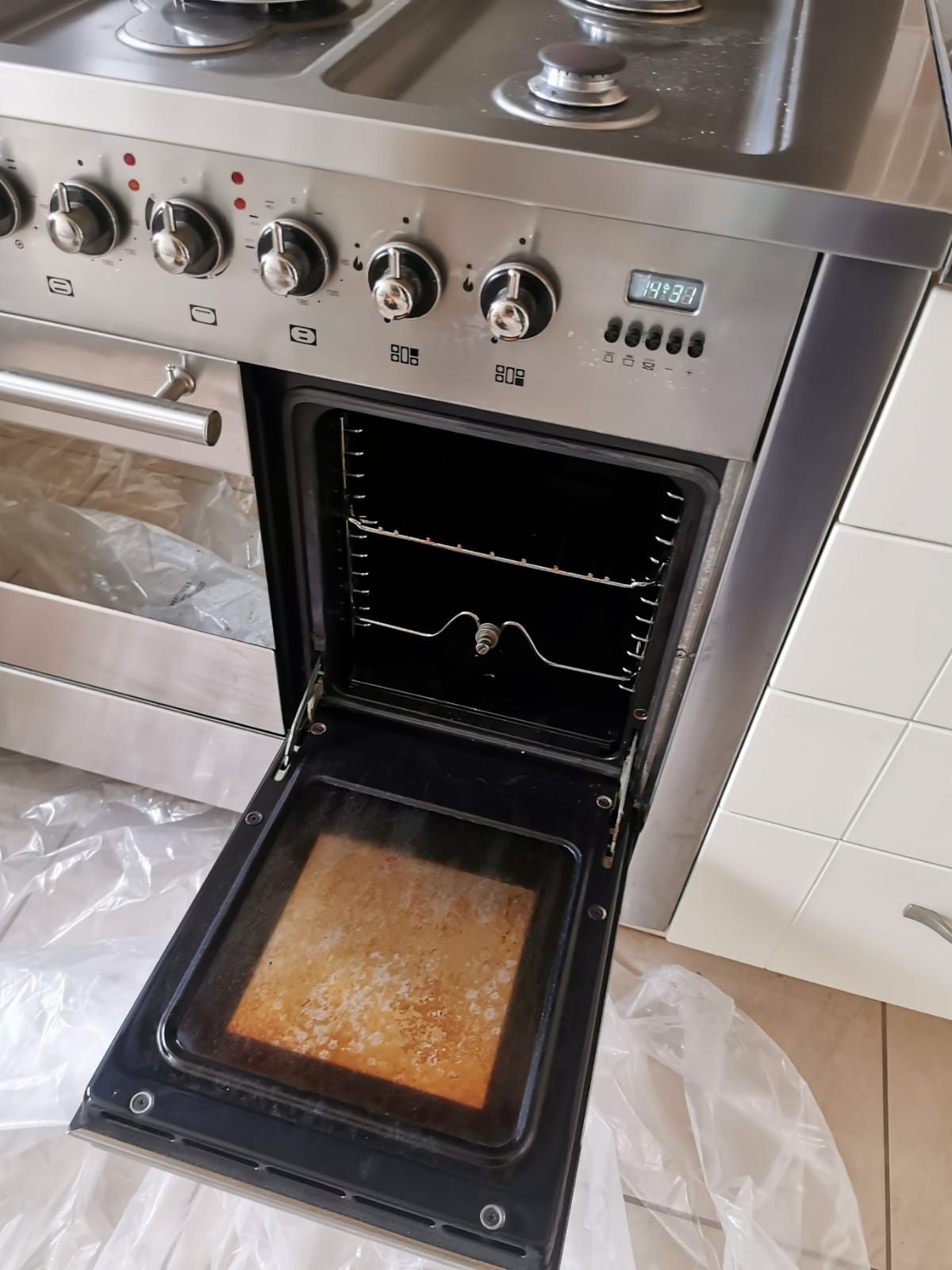 Range Cooker before professional cleaning — grease and carbon build-up